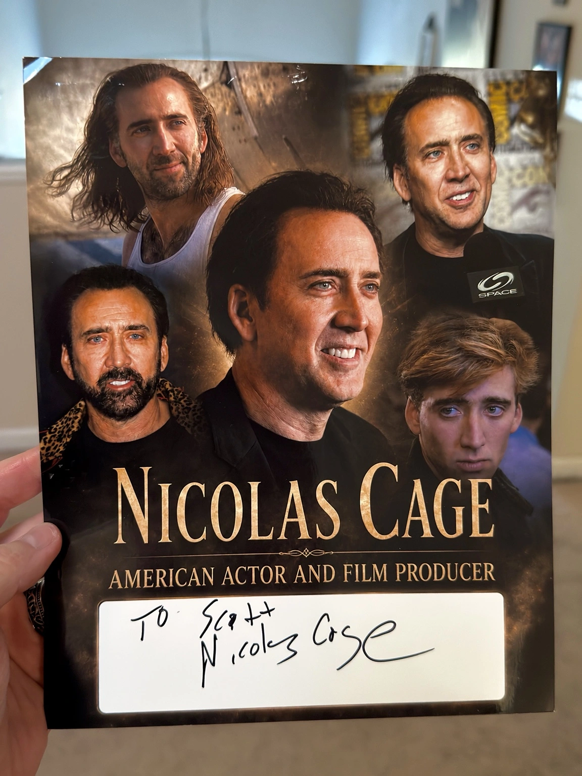 Scott Brooks’s custom Nicolas Cage collage, signed and personalized to Scott.