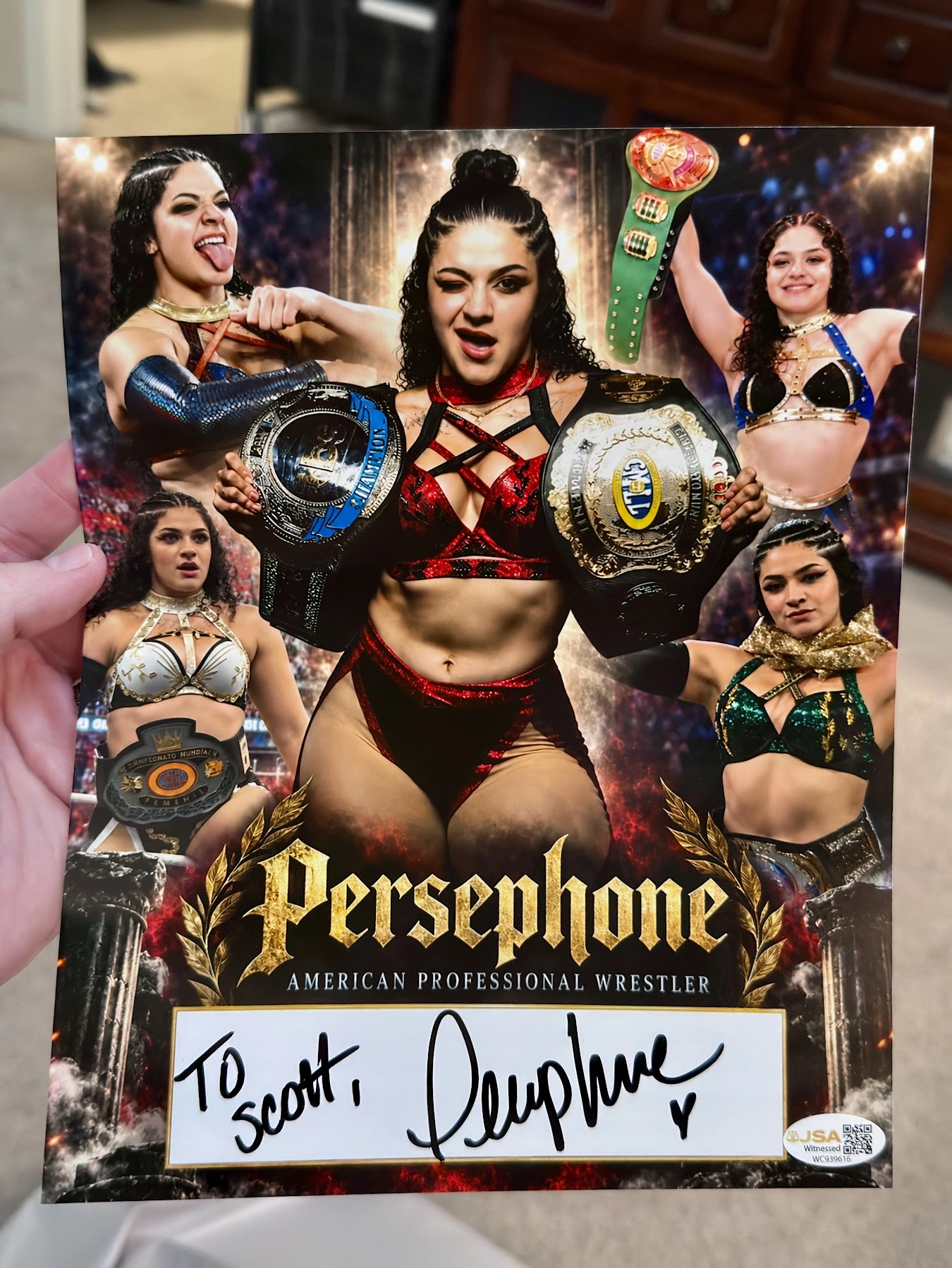 Scott Brooks holding his custom Persephone wrestling collage, personalized To Scott with Persephone’s autograph and a heart in the white signing area.
