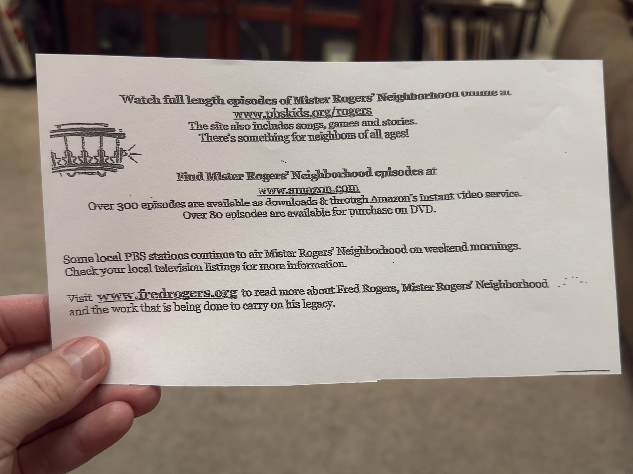 Printed information card about Mister Rogers’ Neighborhood episodes and Fred Rogers’ legacy.